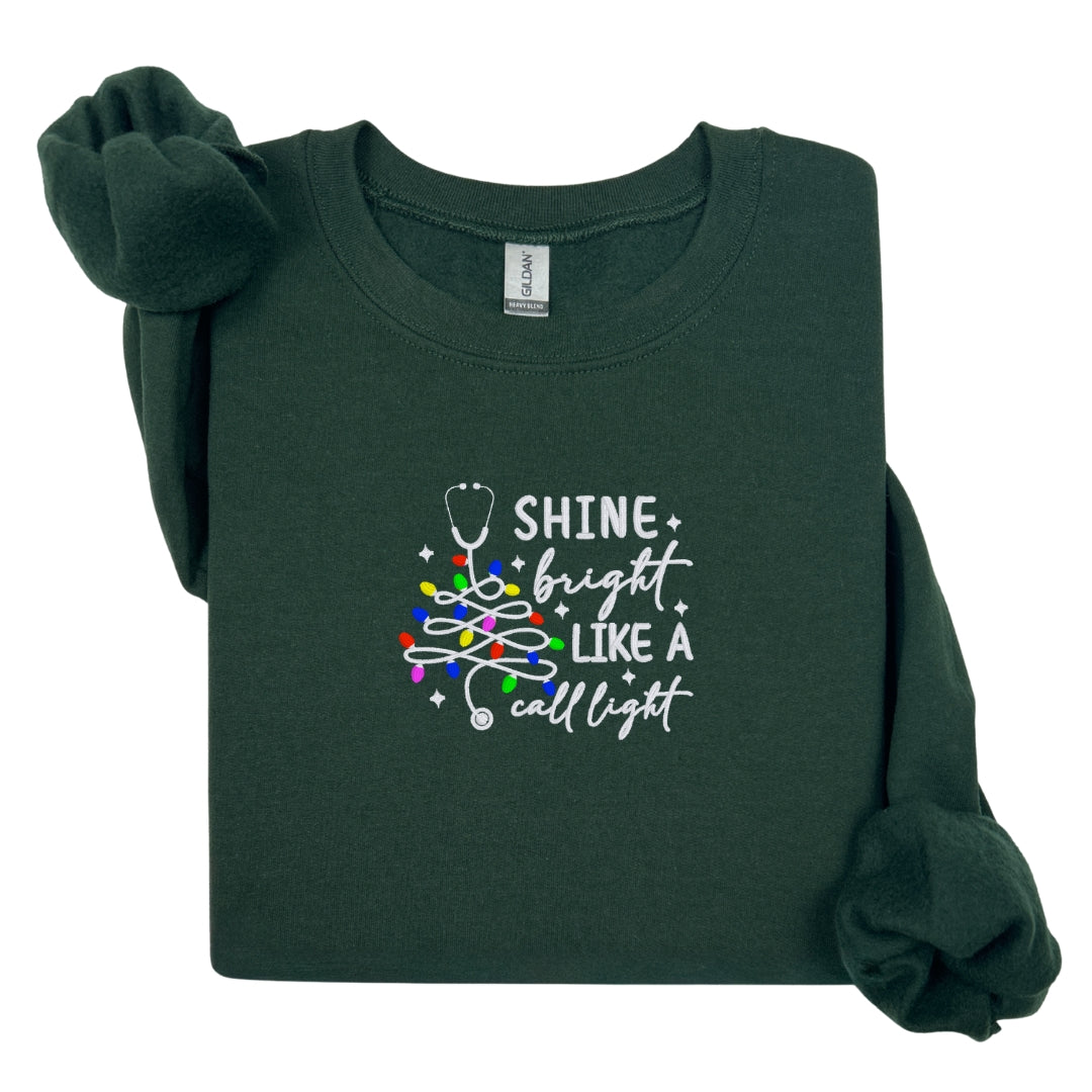 Cozy Nurse Christmas Sweater – Shine Bright Like a Call Light