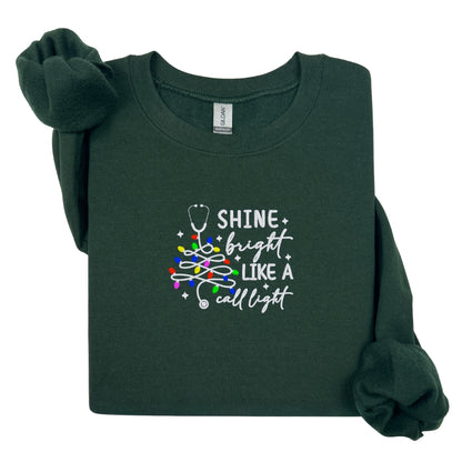 Cozy Nurse Christmas Sweater – Shine Bright Like a Call Light