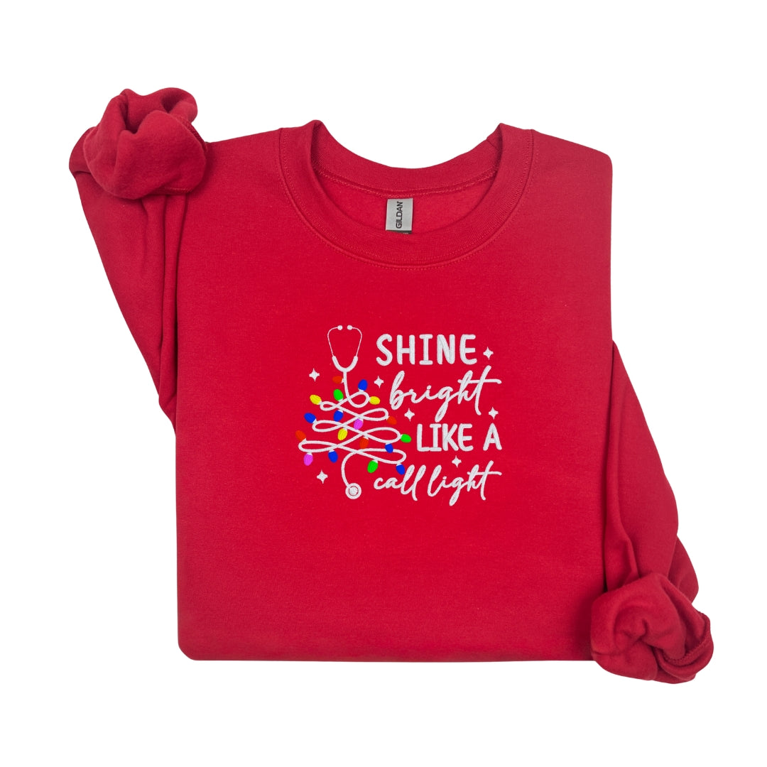 Cozy Nurse Christmas Sweater – Shine Bright Like a Call Light