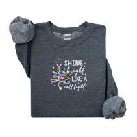 Cozy Nurse Christmas Sweater – Shine Bright Like a Call Light
