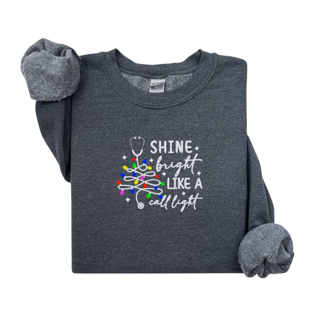 Cozy Nurse Christmas Sweater – Shine Bright Like a Call Light